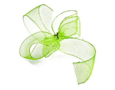 Green ribbon bow on a white background with space for text
