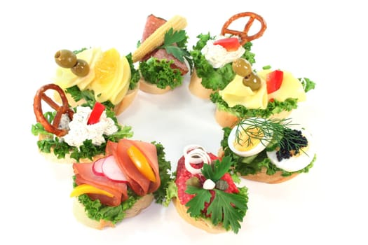 different colored Canapes on a white background