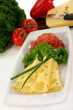 a selection of cold with smoked ham and cheese