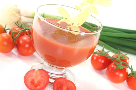 fresh tomato juice with celery, tomatoes and salt and pepper