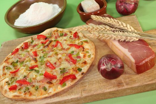 tarte flambee with bacon, green onions and red pepper