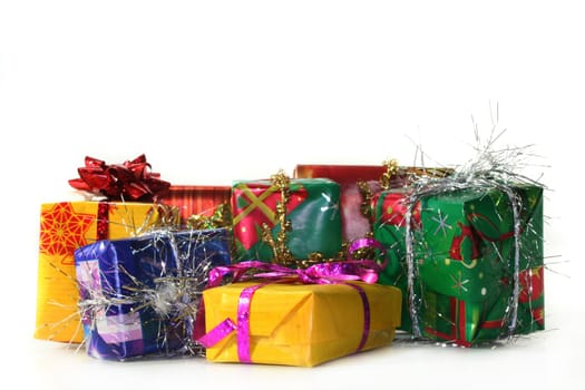 many colorful presents on white background