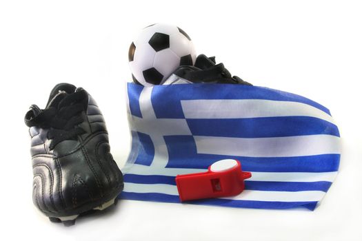 Ball, country flag and soccer shoes on a white background