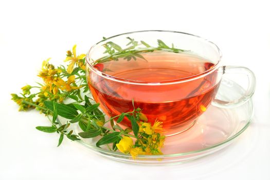 a cup of St. John's Wort Tea with fresh flowers