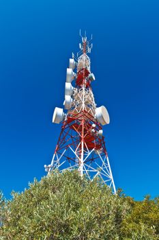 Communications tower with a beautiful blue sky