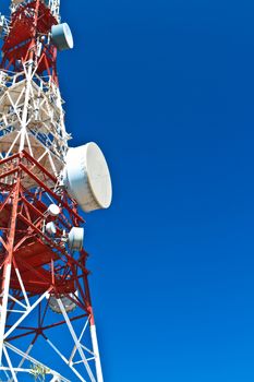 Communications tower with a beautiful blue sky