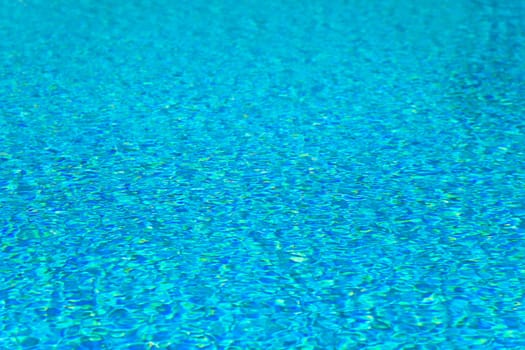 Abstract composition of the water of a swimming pool and its reflections