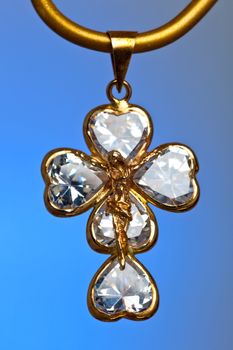 Pendant of a crucifix with five zirconia enchased