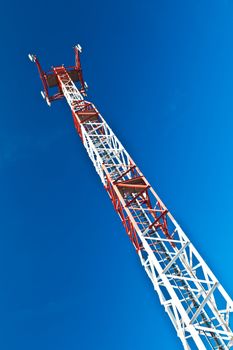 Communications tower with a beautiful blue sky