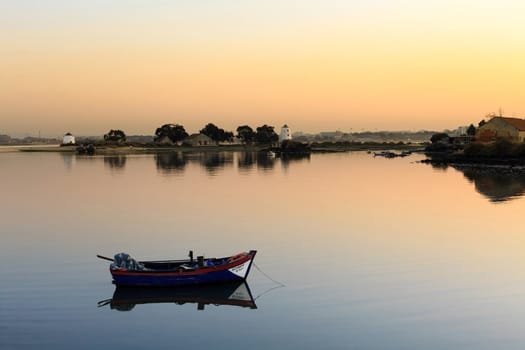 Sunset on the Tejo river with Barreiro mills in background.