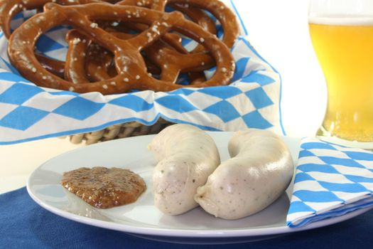 veal sausage with sweet mustard and pretzels