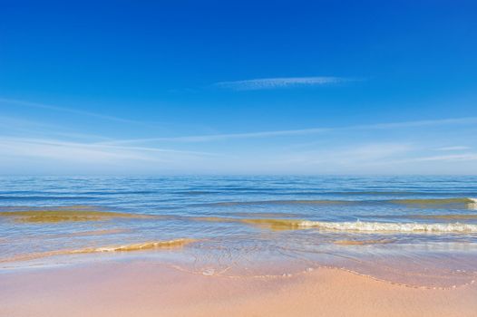 Soft wave of the sea on the sandy beach