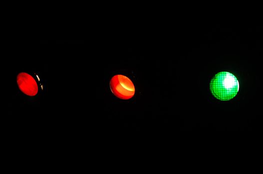 Spotlights on a dark background. 