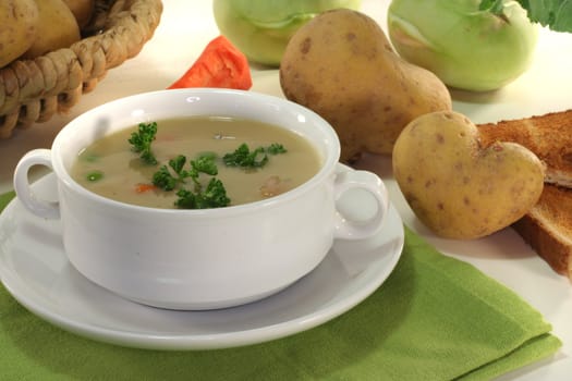 Potato soup with fresh parsley and bacon