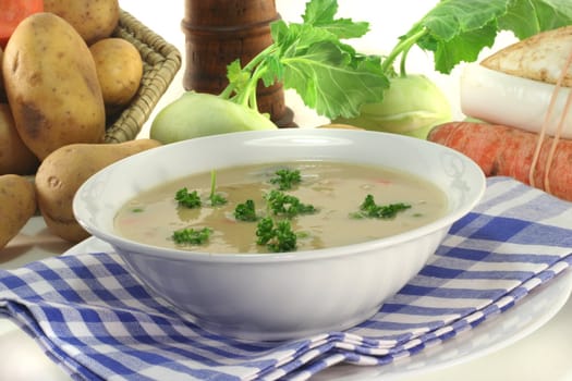 Potato soup with fresh parsley and bacon