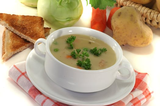 Potato soup with fresh parsley and bacon