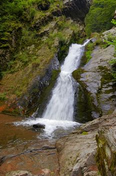 Shot of the fall of water. Stream Huntava - natural area - nature preserve.
Resov, Czech republic, Europe.