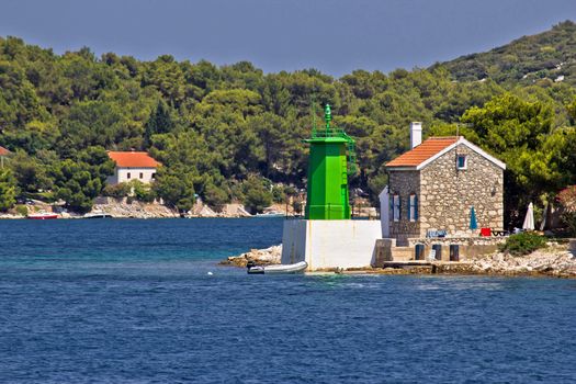 Green lighthouse - lantern in bay entrance, Mali Losinj, Croatia