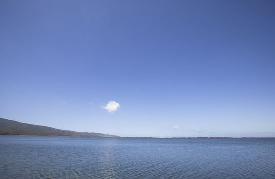 Blue sky, blue sea. The horizon line in Tuscany, Italy