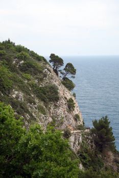 Pictorial blue Adriatic sea with rocks