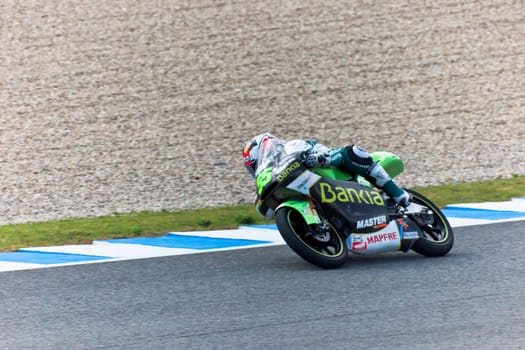 JEREZ DE LA FRONTERA, SPAIN - MAR 5: Moto2 motorcyclist Hector Faubel takes a curve in the MotoGP Official Trainnig on Mar 5, 2011 in Jerez de la Frontera, Spain