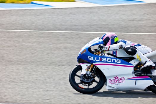 JEREZ DE LA FRONTERA, SPAIN - MAR 5:125cc pilot Sergio Gadea races on the official training of the world championship of MotoGP on Mar 5, 2011, in racetrack of velocity of Jerez de la Frontera, Spain