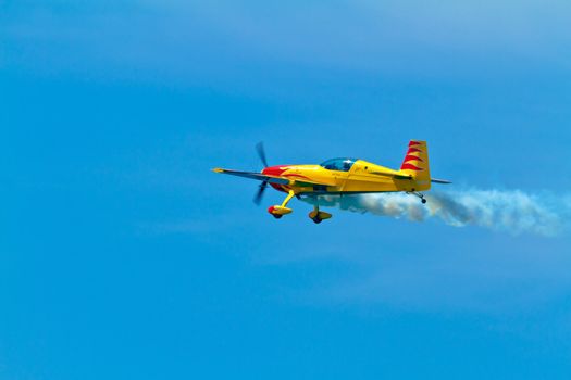 CADIZ, SPAIN-SEP 11: Aircraft Extra 300S of Melissa Pemberton taking part in an exhibition on the 4th airshow of Cadiz on Sep 11, 2011, in Cadiz, Spain