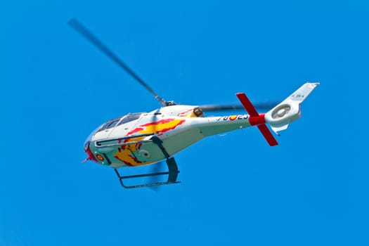 CADIZ, SPAIN-SEP 11: Helicopters of the Patrulla Aspa taking part in an exhibition on the 4th airshow of Cadiz on Sep 11, 2011, in Cadiz, Spain