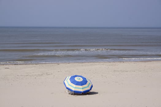 Sunshade  in the sand along the Frenc coast