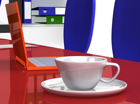 Cup on the office desk near orange laptop