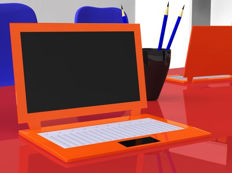 3d stereoscopic laptops on red table with blue pencils