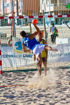 CADIZ, SPAIN - JULY 19: Unidentified players compete in a match between Valcarcel Recuperado and DecoHogar in the 19th league of beach handball of Cadiz on July 19, 2011 in Cadiz, Spain