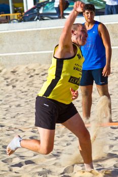 CADIZ, SPAIN - JULY 19: Unidentified players compete in a match between Valcarcel Recuperado and DecoHogar in the 19th league of beach handball of Cadiz on July 19, 2011 in Cadiz, Spain