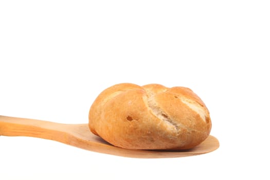 Bun on a spoon against a white background