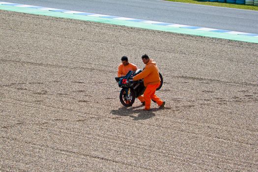 JEREZ DE LA FRONTERA, SPAIN-MAR 5: 125cc motorcycle of Daniel Kartheininge after an accident on the official training of the world championship of MotoGP on March 5,2011 in Jerez de la Frontera, Spain