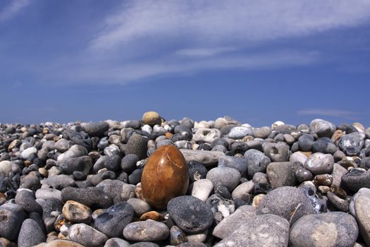 Flintstone on the beach along the coast of Normandie in France
