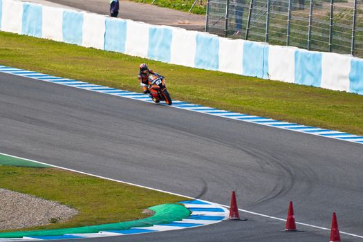 JEREZ DE LA FRONTERA, SPAIN - MAR 5: Moto2 motorcyclist Marc Marquez takes a curve in the MotoGP Official Trainnig on Mar 5, 2011 in Jerez de la Frontera, Spain