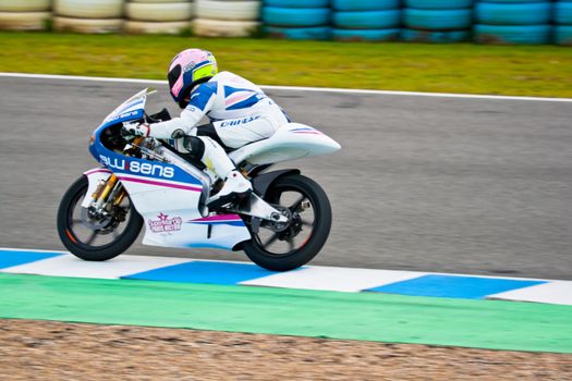 JEREZ DE LA FRONTERA, SPAIN - MAR 5:125cc pilot Sergio Gadea races on the official training of the world championship of MotoGP on Mar 5, 2011, in racetrack of velocity of Jerez de la Frontera, Spain