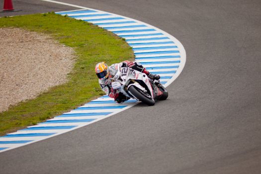 JEREZ DE LA FRONTERA, SPAIN - NOV 20: Stock Extreme motorcyclist Javier Fores takes a curve in the CEV championship on Nov 20, 2010, in Jerez de la Frontera, Spain