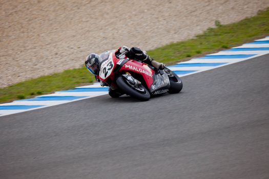 JEREZ DE LA FRONTERA, SPAIN - NOV 20: Stock Extreme motorcyclist Adrian Bonastre takes a curve in the CEV championship on Nov 20, 2010, in Jerez de la Frontera, Spain