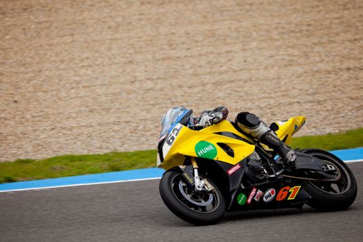 JEREZ DE LA FRONTERA, SPAIN - NOV 20: Stock Extreme motorcyclist Felix Rodriguez takes a curve in the CEV championship on Nov 20, 2010, in Jerez de la Frontera, Spain