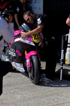 JEREZ DE LA FRONTERA, SPAIN - APR 17: Moto2 Motorcycle of Ivan Moreno waiting in the pitlane in the CEV Championship on April 17, 2011, in Jerez de la Frontera