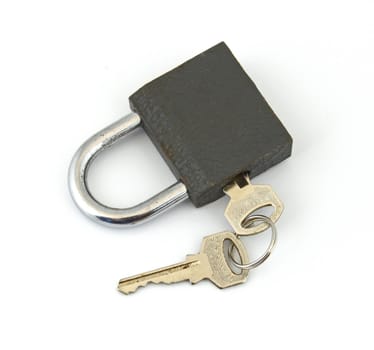 Padlock and key on a plain white background.