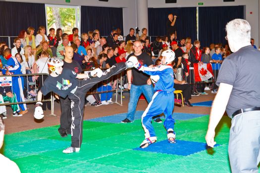 CHICLANA DE LA FRONTERA, SPAIN-NOV 05: Unidentified players compete in the 3rd World Karate and Kickboxing Council championship  on Nov 05, 2011, in Chiclana de la Frontera,  Spain