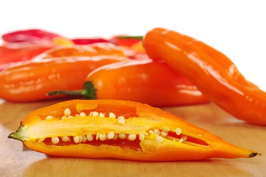 Aji, Peruvian hot pepper, on wooden board  