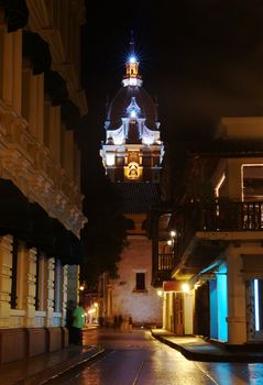 Church lit at night in the old historical part of Cartagena, Colombia  