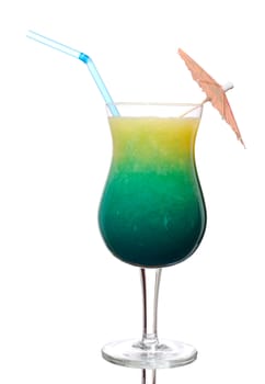 Blue Curacao and orange juice in a cocktail glass decorated with a sunshade and a drinking straw