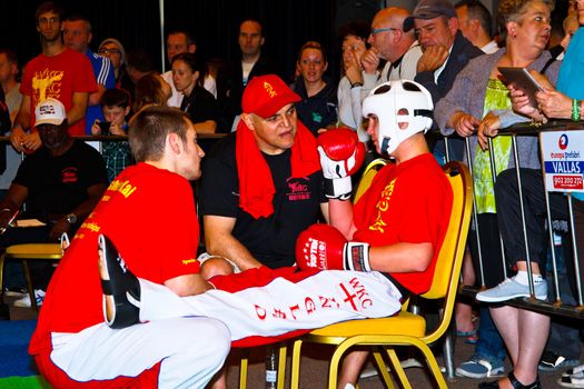 CHICLANA DE LA FRONTERA, SPAIN-NOV 05: Unidentified players with her trainer compete in the 3rd World Karate and Kickboxing Council championship  on Nov 05, 2011, in Chiclana de la Frontera,  Spain