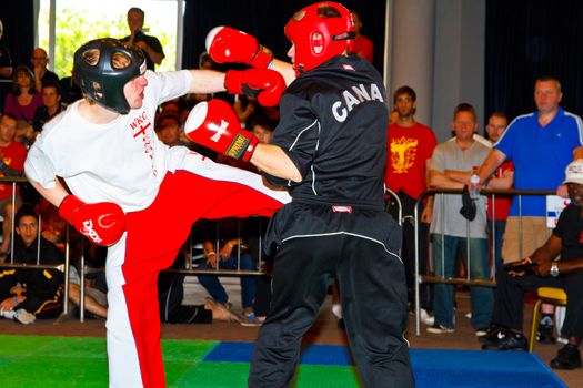 CHICLANA DE LA FRONTERA, SPAIN-NOV 05: Unidentified players compete in the 3rd World Karate and Kickboxing Council championship  on Nov 05, 2011, in Chiclana de la Frontera,  Spain