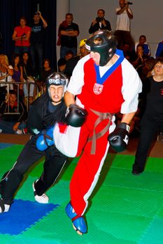 CHICLANA DE LA FRONTERA, SPAIN-NOV 05: Unidentified players compete in the 3rd World Karate and Kickboxing Council championship  on Nov 05, 2011, in Chiclana de la Frontera,  Spain